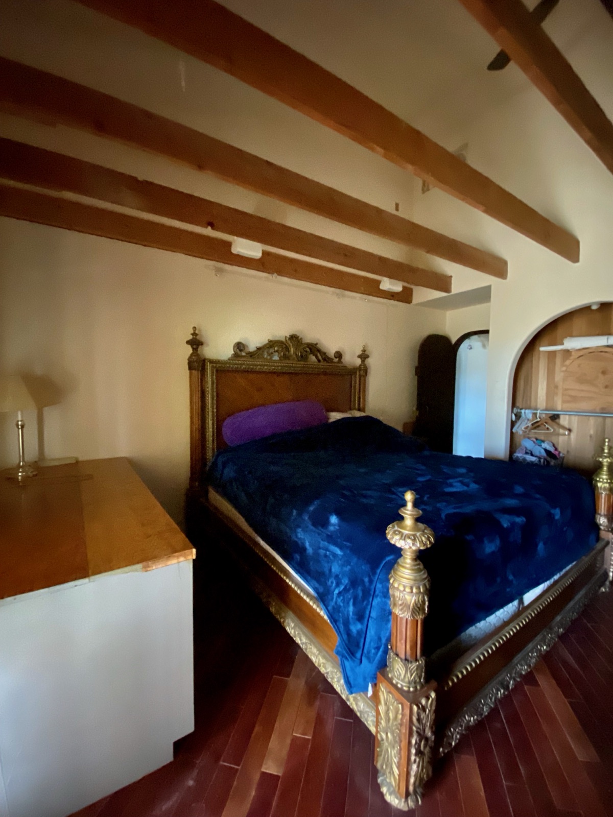 The master suite, with its carved bed